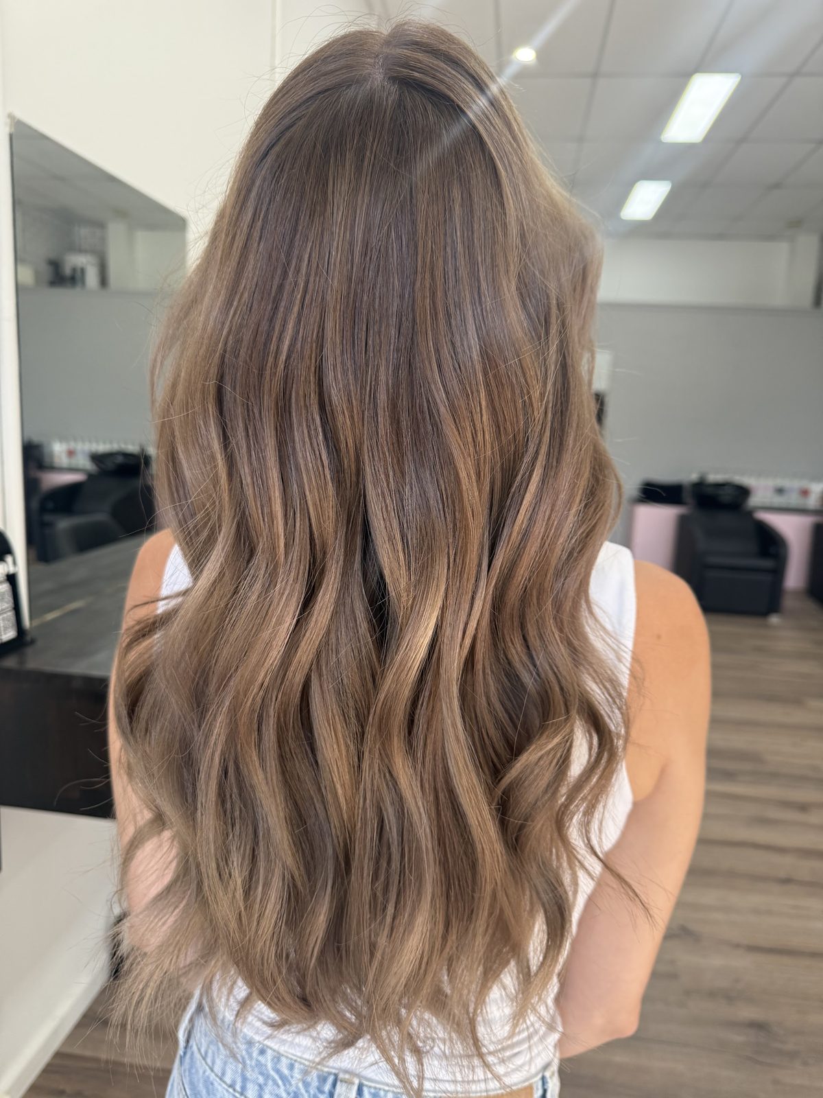 Soft brunette balayage with caramel tones